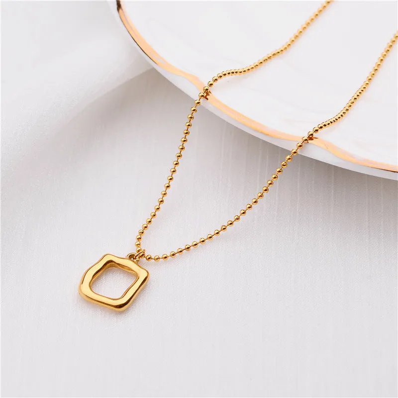 Gold plated titanium necklace with Clavicle Chain and geometric hollow square